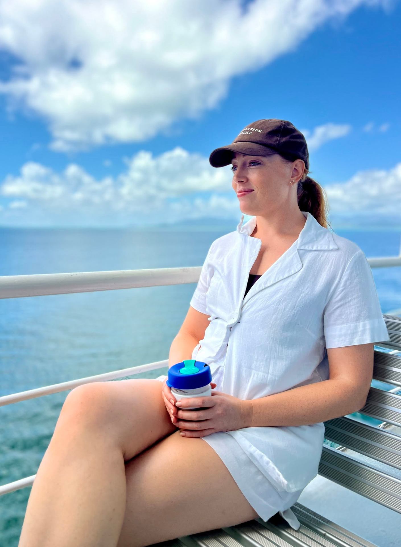 Guest enjoying coffee on the ferry to Magnetic Island