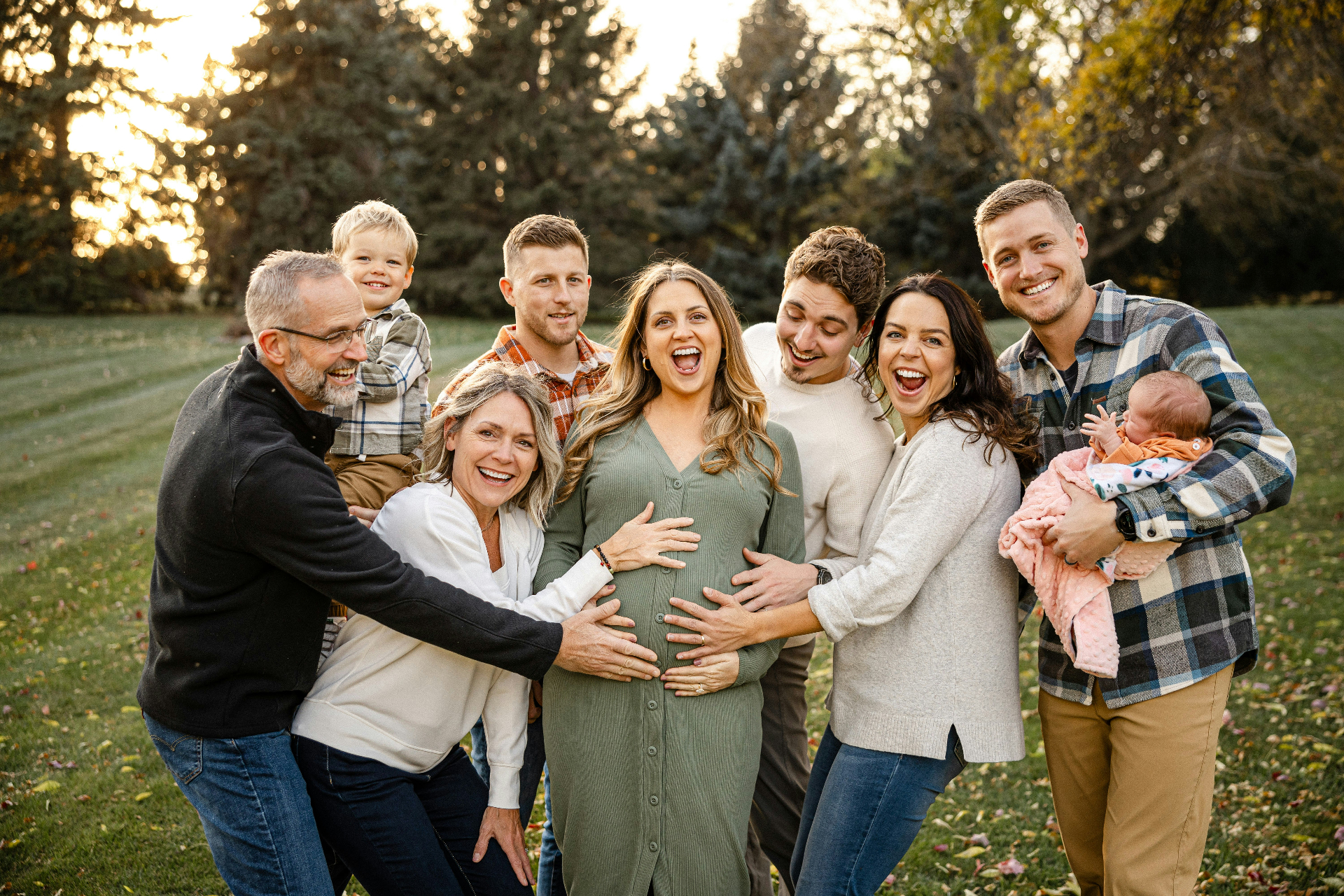 Multi-generation family reunion at sunset